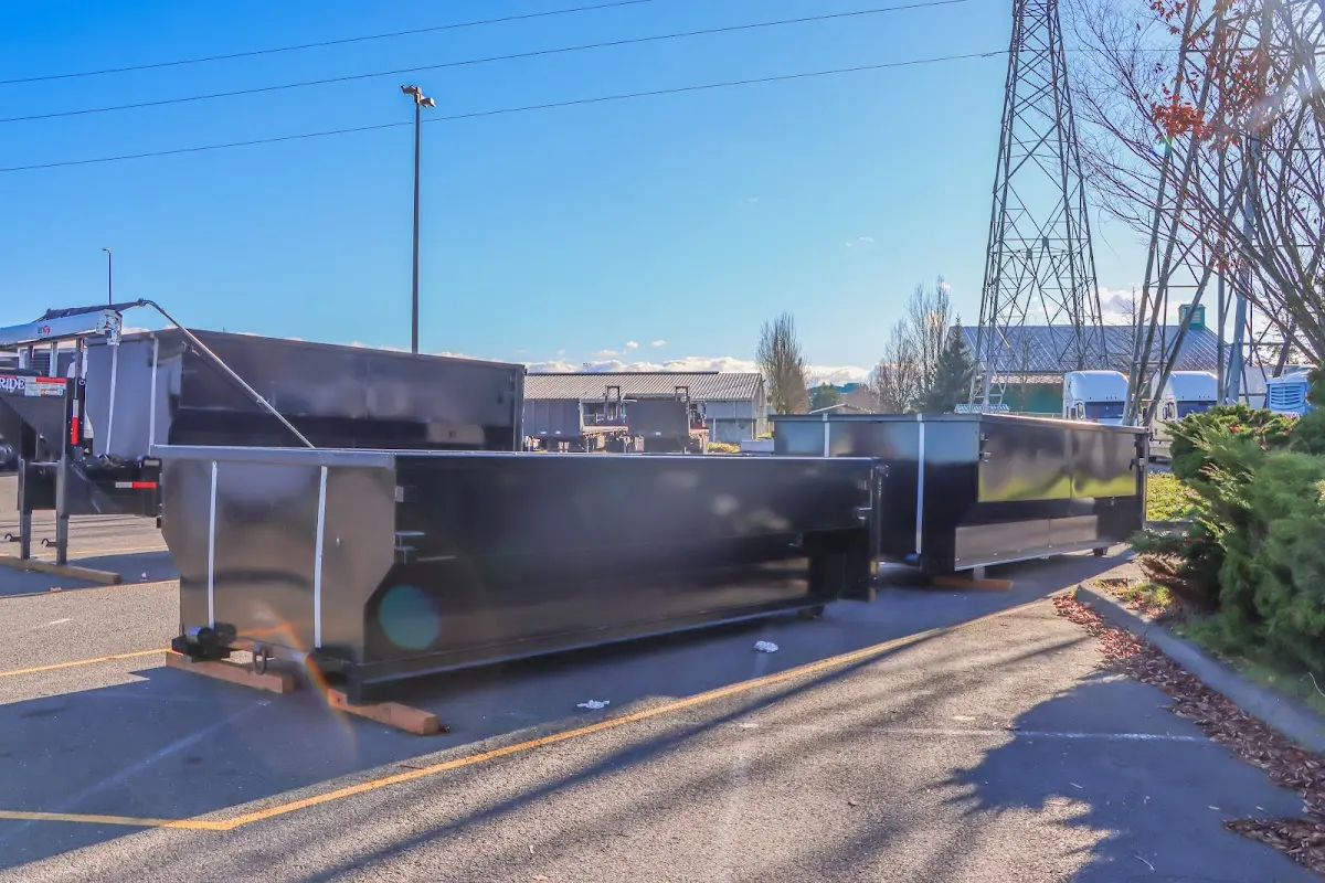 Roll-off dumpster ready for waste disposal at job site for Commercial Dumpster Rental in Tittabawassee